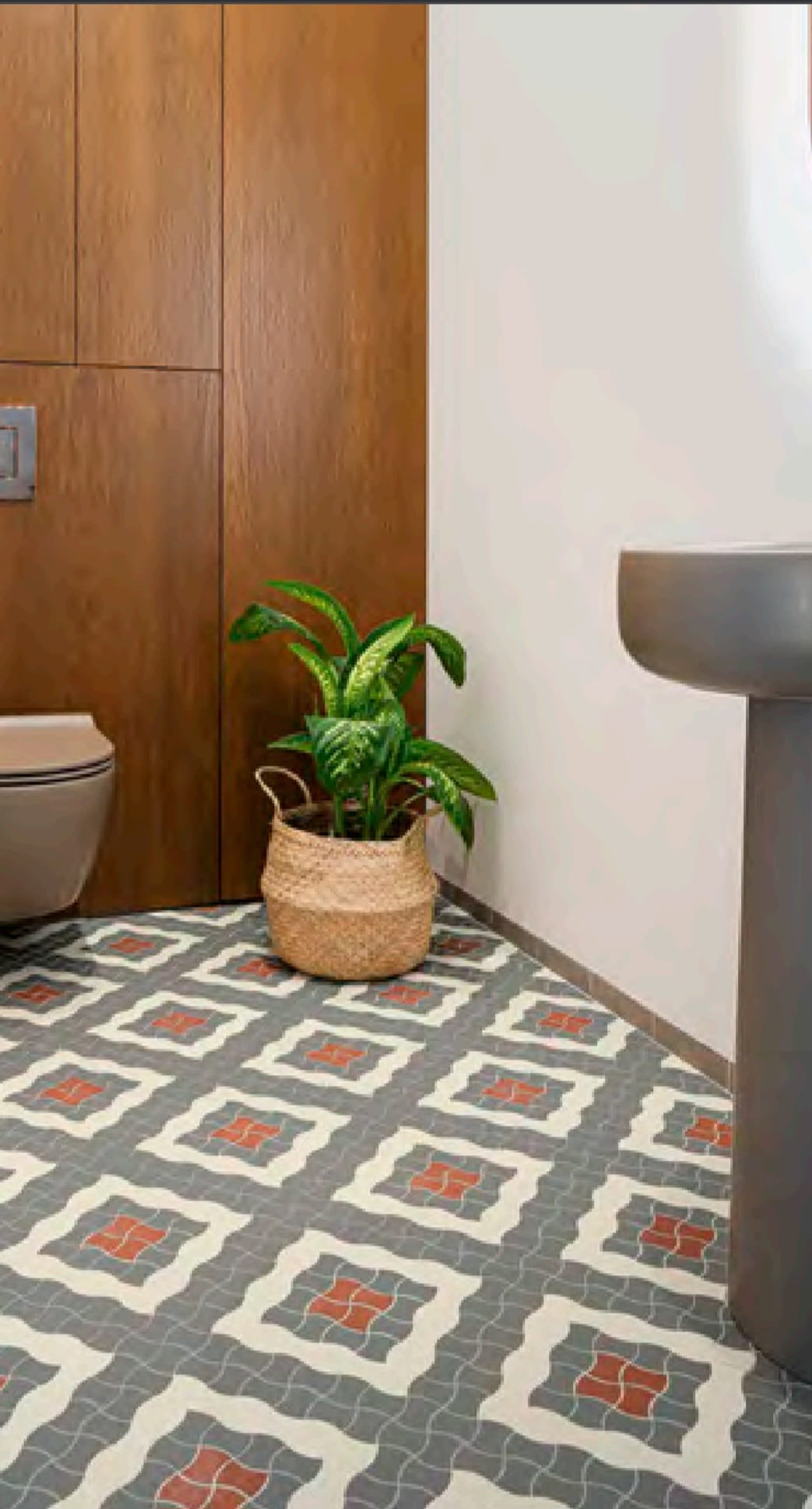 Pavimento cementine grigio e arancio